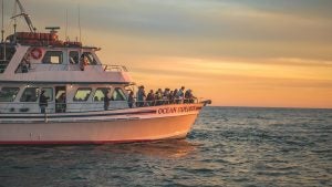 people aboard a sunset cruise